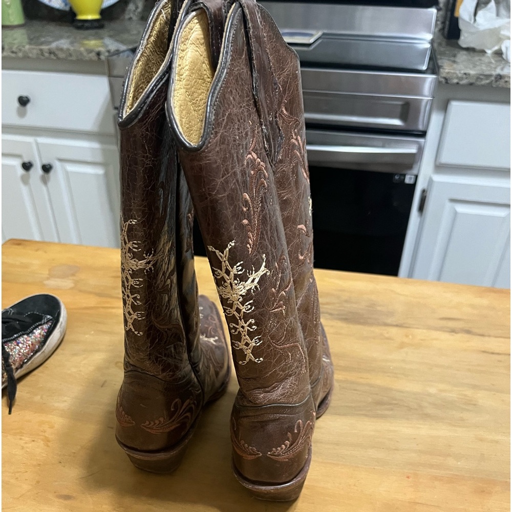 Like new boots. Super cute! Paid 250.